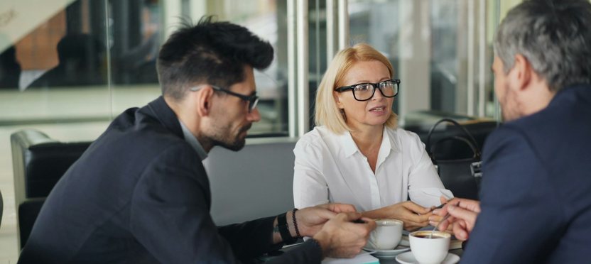 An advisor going through a payment plan with clients